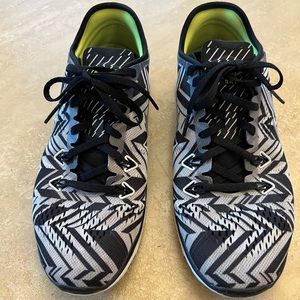 Nike Free TR Fit 5 size 8.5 gently used, black and white, with silver swoosh